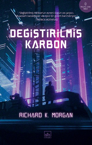 Belki kitabı da beraberinde okumak istersiniz. Altered Carbon, Değiştirilmiş Karbon adıyla İthaki Yayınları tarafından yayımlandı. Metroda her yerde ilanları var, görmüşsünüzdür.